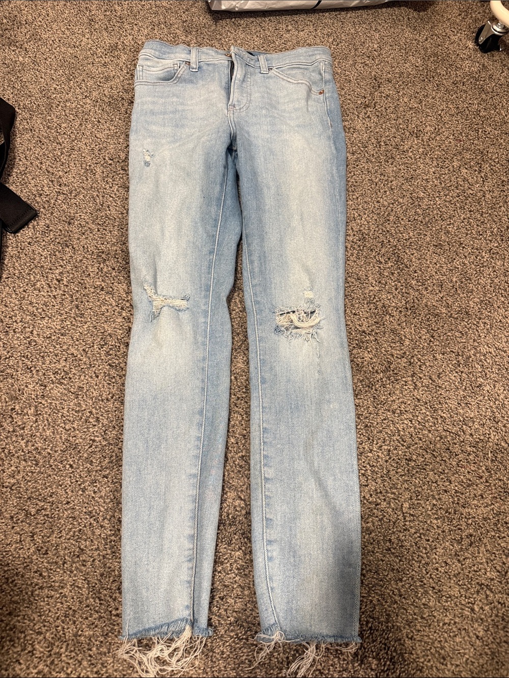 Light Blue Express Distressed skinny mid rise jeans